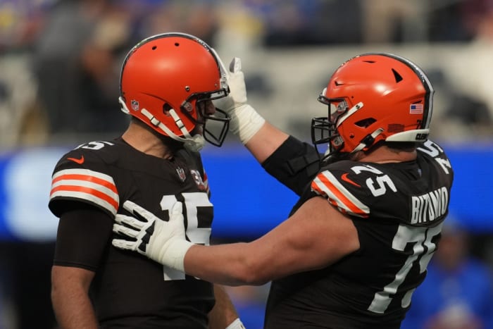 leveland Browns quarterback Joe Flacco (15) celebrates with guard Joel Bitonio (75) after a touchdown against the Los Angeles Rams in the first half at SoFi Stadium. Credit: Kirby Lee-USA
